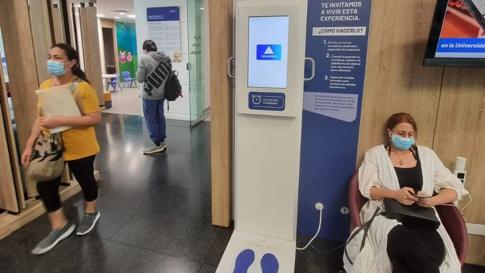 Interactive biometric measurement kiosk designed to enrich and utilize time during the waiting experience